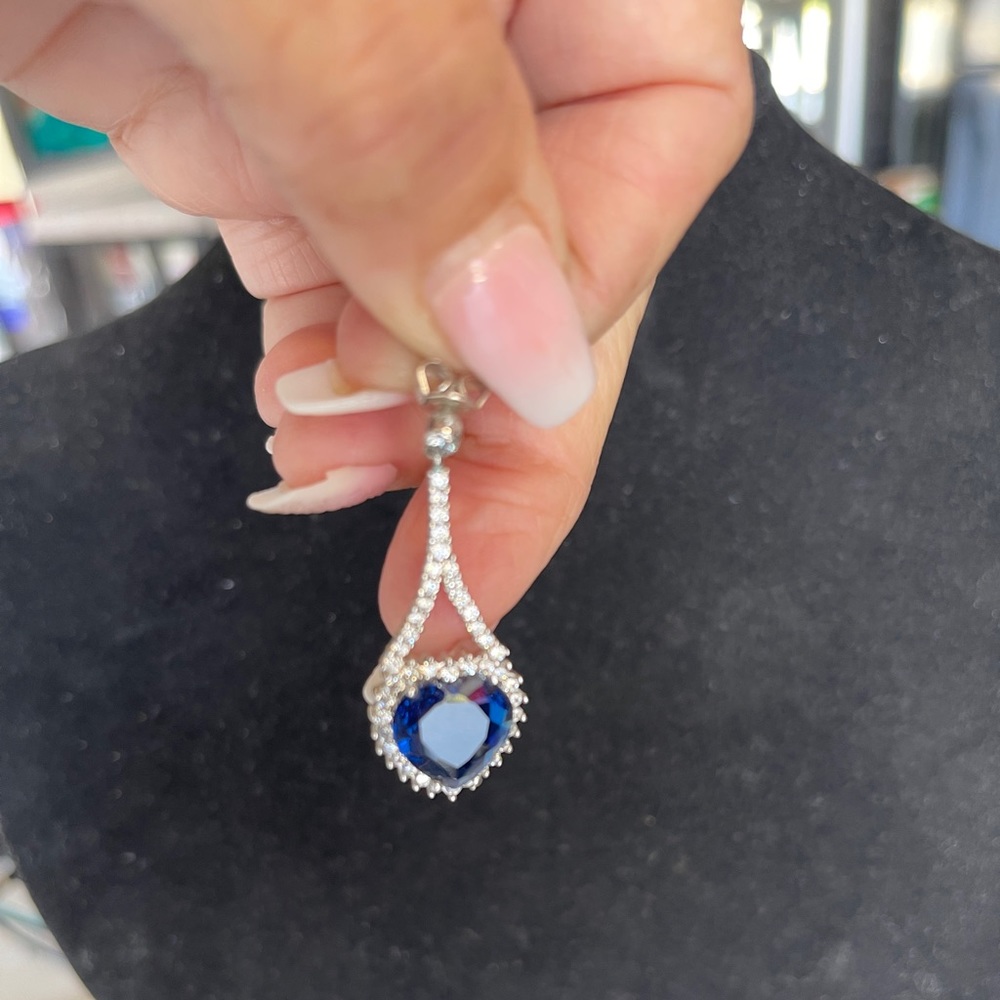 Sterling silver pierced earrings.